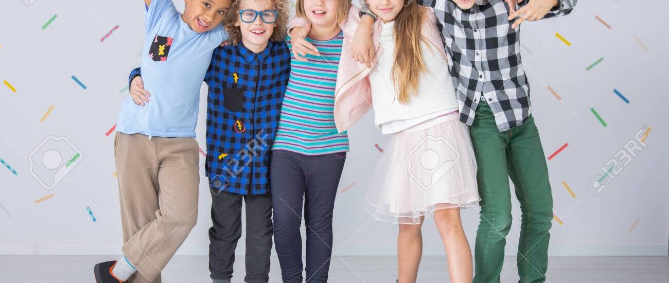 Child wearing oversized pastel tee and relaxed jeans inspired by kids fashion trends 2026